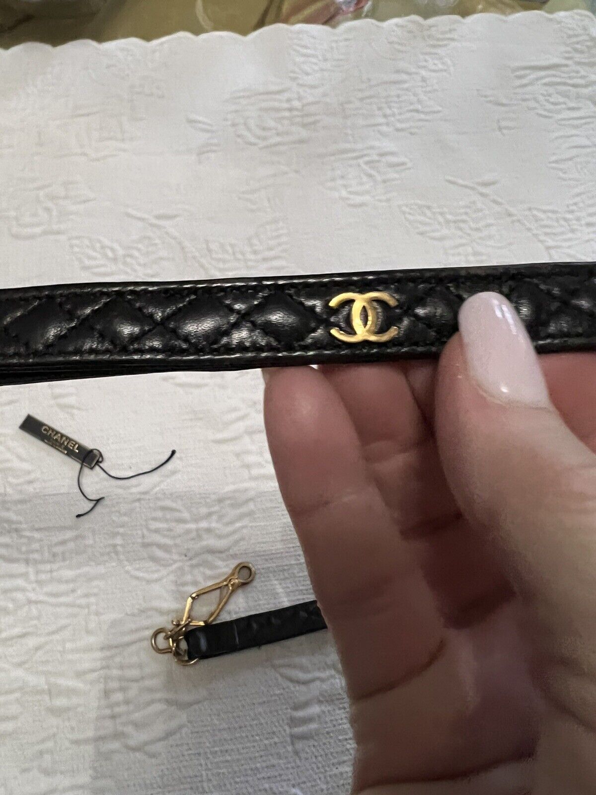VINTAGE CHANEL QUILTED BLACK LEATHER DOG LEASH w TAG. NEIMAN MARCUS. NO COLLAR.